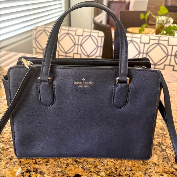 kate spade Handbags - Kate Spade Laurel Way Reese Satchel Bag.  Black with gold lettering.